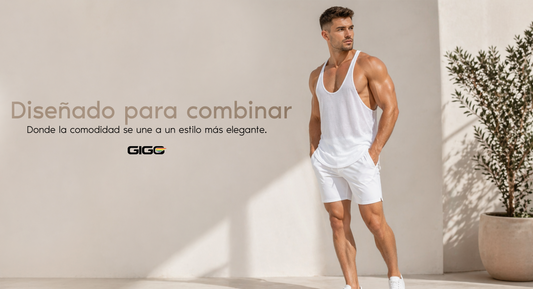 Modelo masculino usando camisilla blanca y short blanco Gigo en un look sportwear limpio para clima cálido.